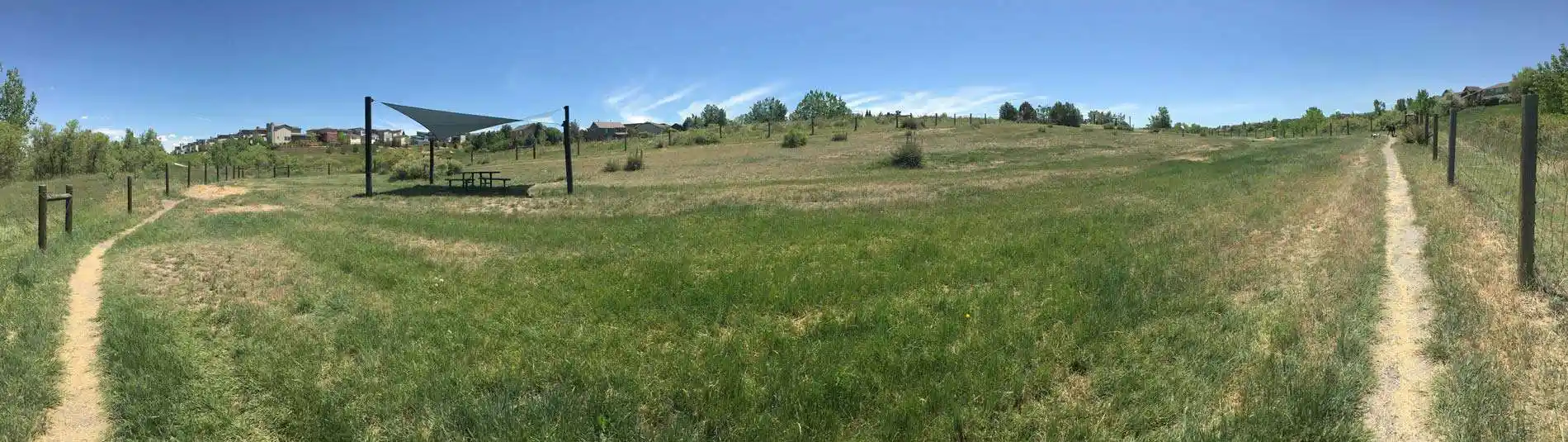 Map and layout of Digger's Off-Leash Dog Park at Dad Clark Park (3385 Astorbrook Circle) in Highlands Ranch showing the fenced off-leash dog enclosure, trails, and adjacent park fields