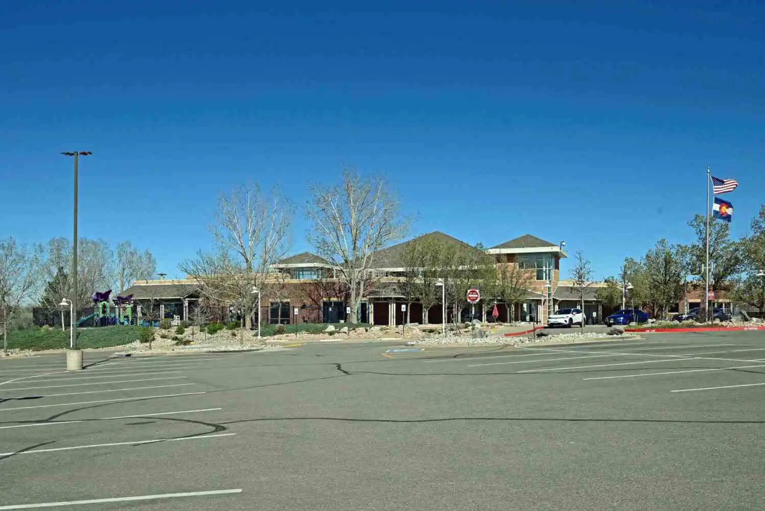 Westridge Recreation Center exterior and athletic fields adjacent to Westridge Village in Highlands Ranch, Colorado 80129