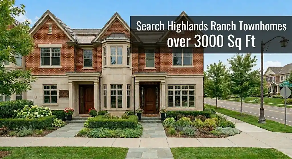 Luxury brick and stone townhomes over 3,000 square feet in Highlands Ranch, Colorado featuring manicured landscaping and attached garages.